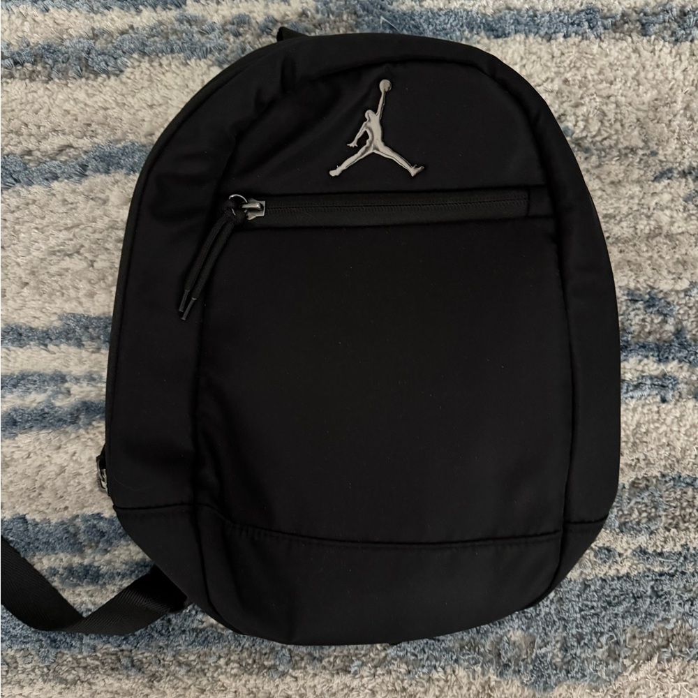 Nike Jordan mini backpack in black (red interior)